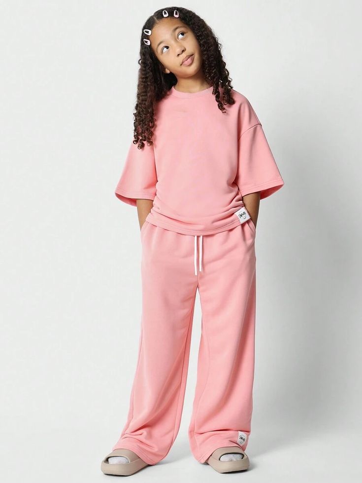 Conjunto Infantil Rosa Casual com T-Shirt Oversized e Calça Wide Leg
